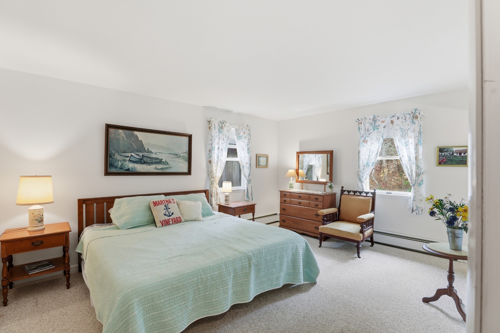 10 Pease Point Road Edgartown, MA 02539 - Photo 9 of 21 a bedroom with furniture and a painting on the wall