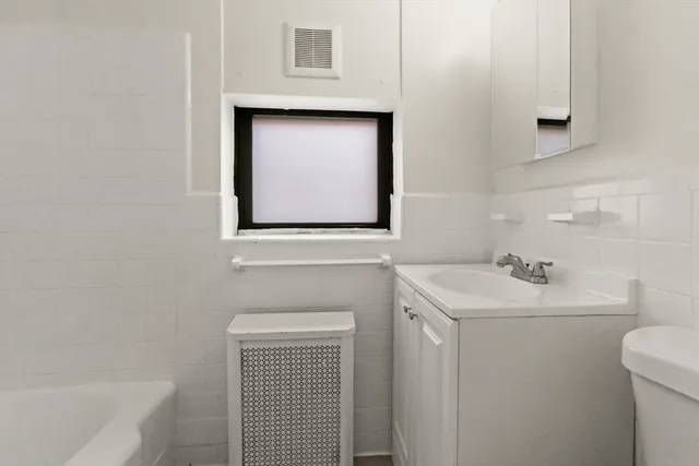 a bathroom with a sink and a toilet