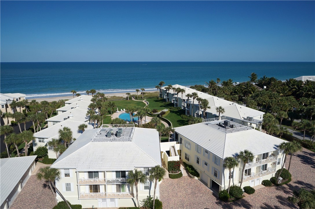 1180 Reef Road, Unit A20 Vero Beach, FL 32963 - Photo 24 of 32 an aerial view of a house with a yard