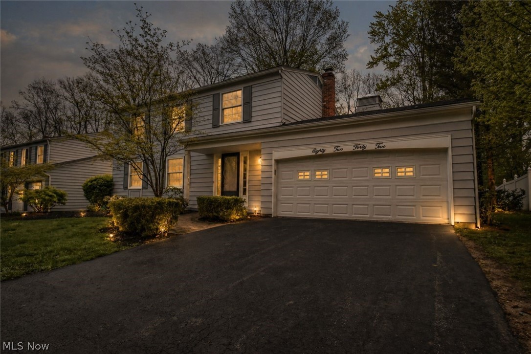 8242 Starburst Road Mentor, OH 44060 - Photo 2 of 37 Classic two-story residence with light-toned siding and dark shutters