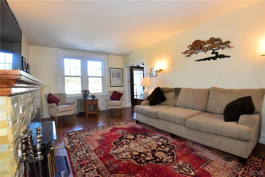 1776 Friedensville Road Hellertown, PA 18055 - Photo 12 of 23 a living room with furniture and a rug