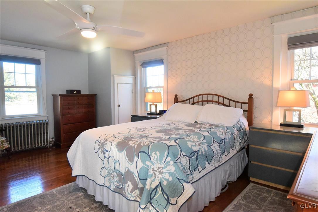 1776 Friedensville Road Hellertown, PA 18055 - Photo 15 of 23 a bedroom with a bed and wooden floor