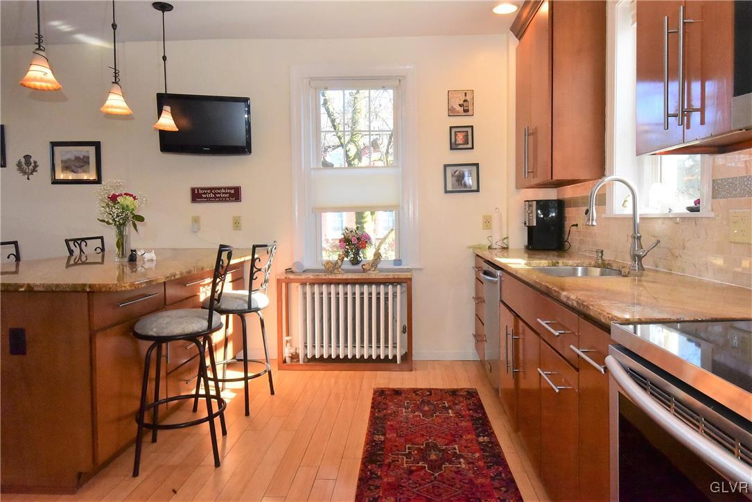 1776 Friedensville Road Hellertown, PA 18055 - Photo 2 of 23 a kitchen with sink cabinets and outdoor view
