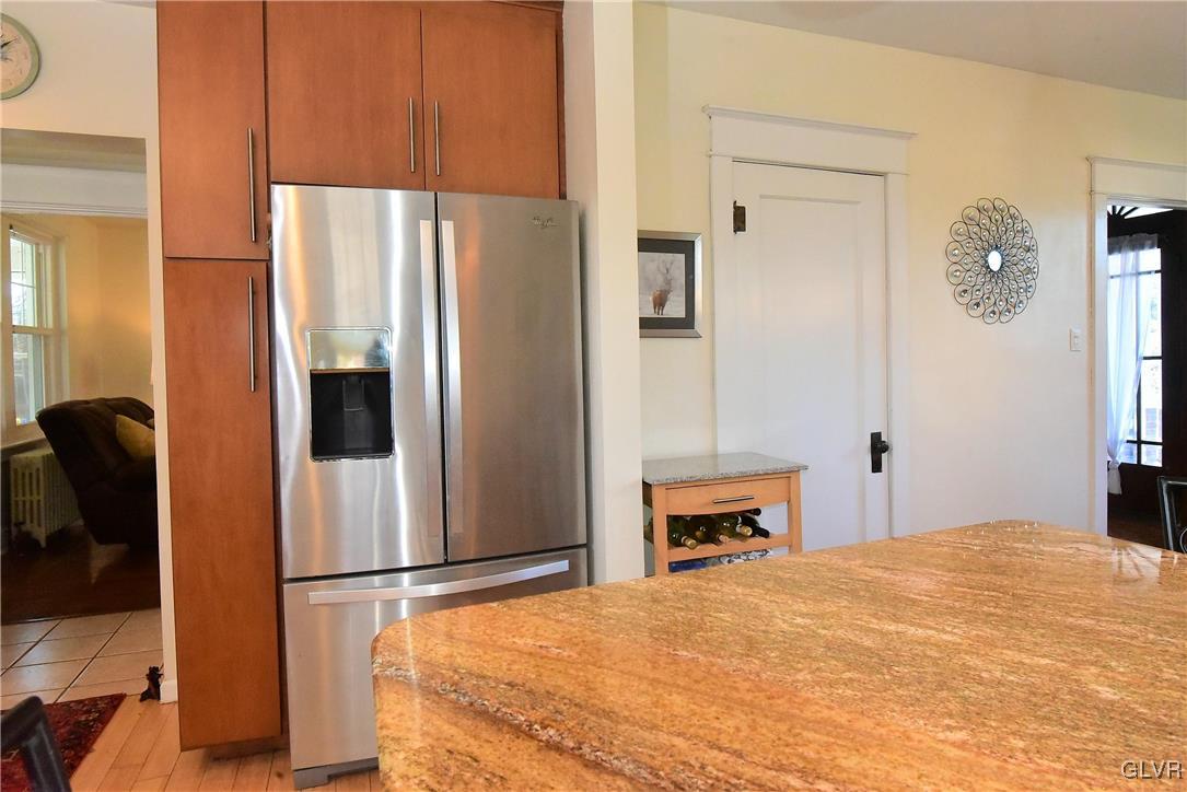 1776 Friedensville Road Hellertown, PA 18055 - Photo 5 of 23 a bedroom with a bed and a refrigerator