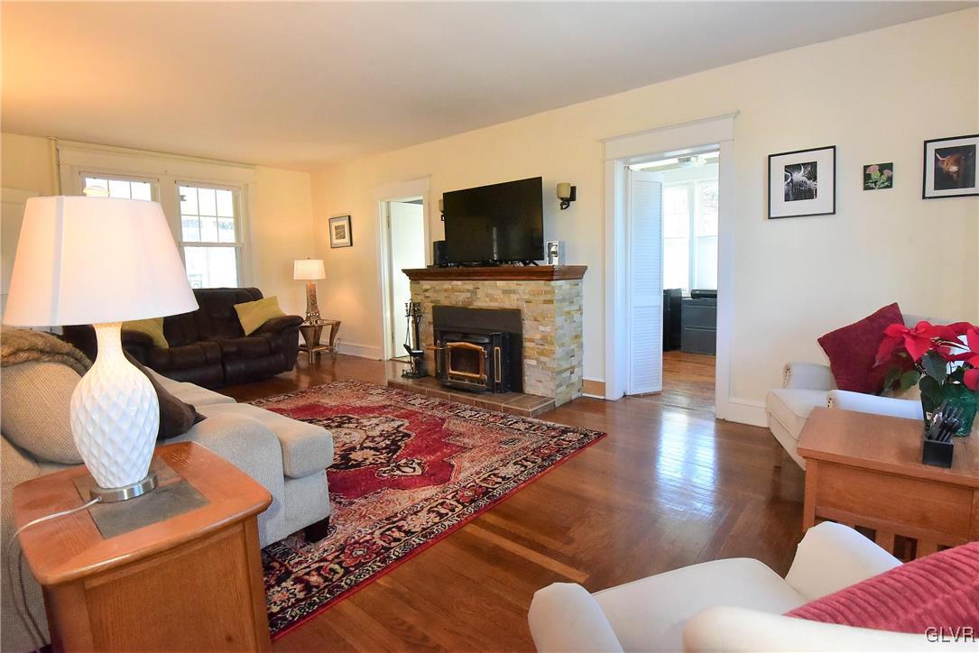 1776 Friedensville Road Hellertown, PA 18055 - Photo 9 of 23 a living room with furniture and a flat screen tv