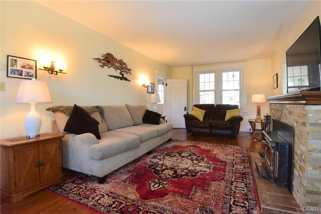 1776 Friedensville Road Hellertown, PA 18055 - Photo 10 of 23 a living room with furniture and a fireplace