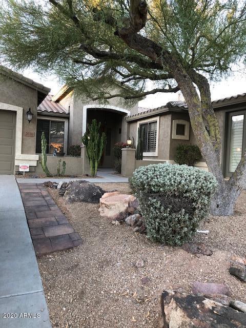 2050 North Piedra Mesa, AZ 85207 - Photo 1 of 10 a front view of a house with garden