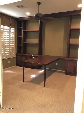 a room with furniture and a window