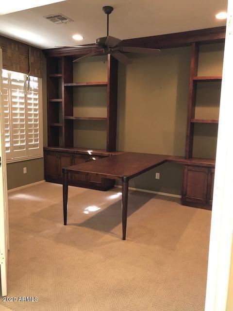 2050 North Piedra Mesa, AZ 85207 - Photo 3 of 10 a room with furniture and a window