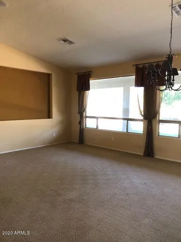 a view of a yard with an outdoor space