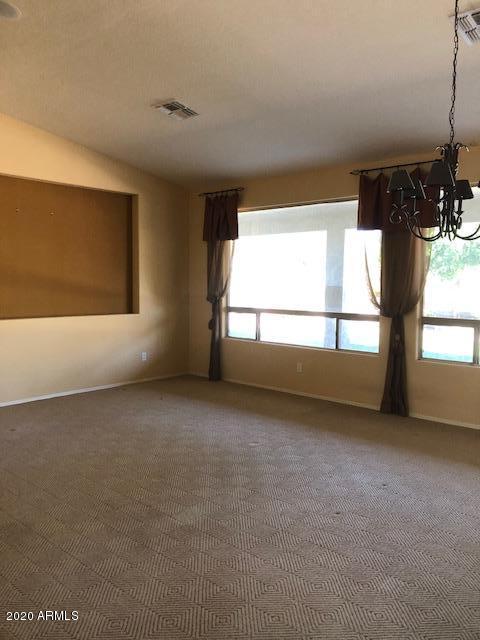 2050 North Piedra Mesa, AZ 85207 - Photo 8 of 10 a view of an empty room with a window