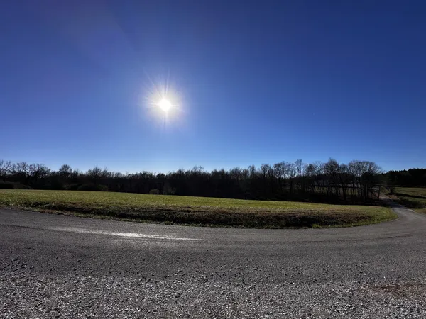 a view of mountain and sunset