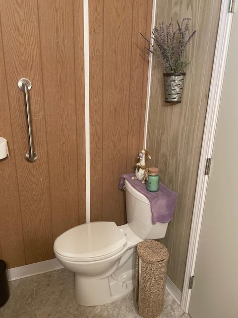 4125 Mchenry Avenue, Unit 35 Modesto, CA 95356 - Photo 7 of 20 a white toilet sitting next to a shower curtain