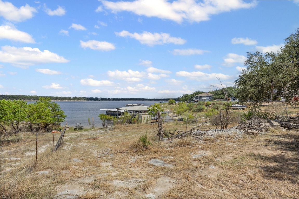 1505 Chipmunk Road Austin, TX 78734 - Photo 7 of 19 a view of a lake with a yard