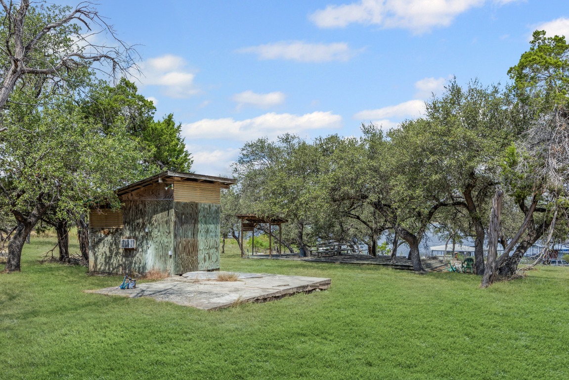 1505 Chipmunk Road Austin, TX 78734 - Photo 8 of 19 a backyard of a house with lots of green space