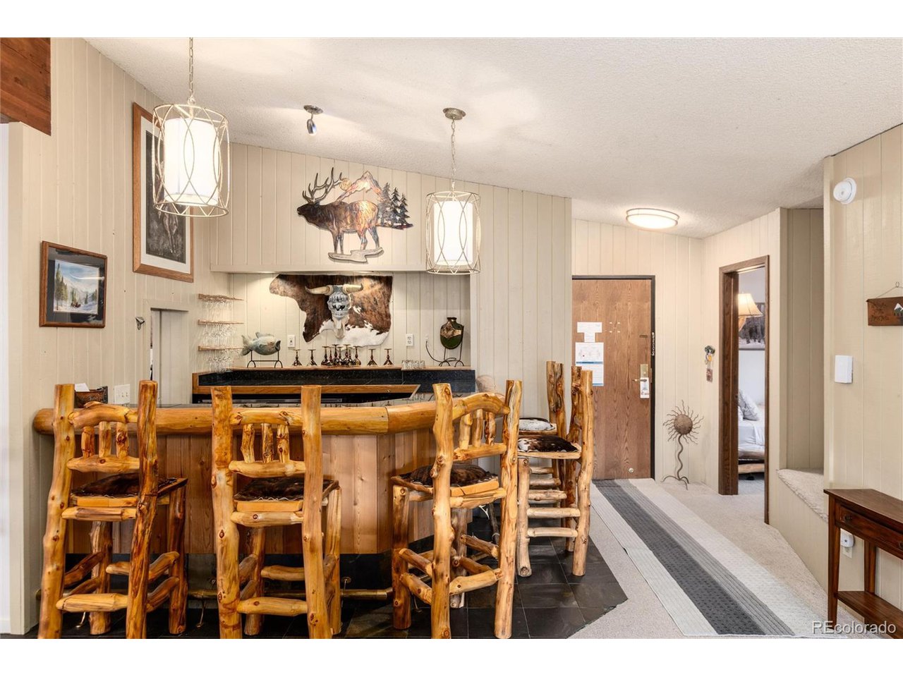 490 Kings Crossing Road, Unit 631 Winter Park, CO 80482 - Photo 13 of 43 a dining room with furniture and window