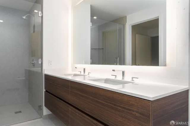 a bathroom with a sink and a mirror