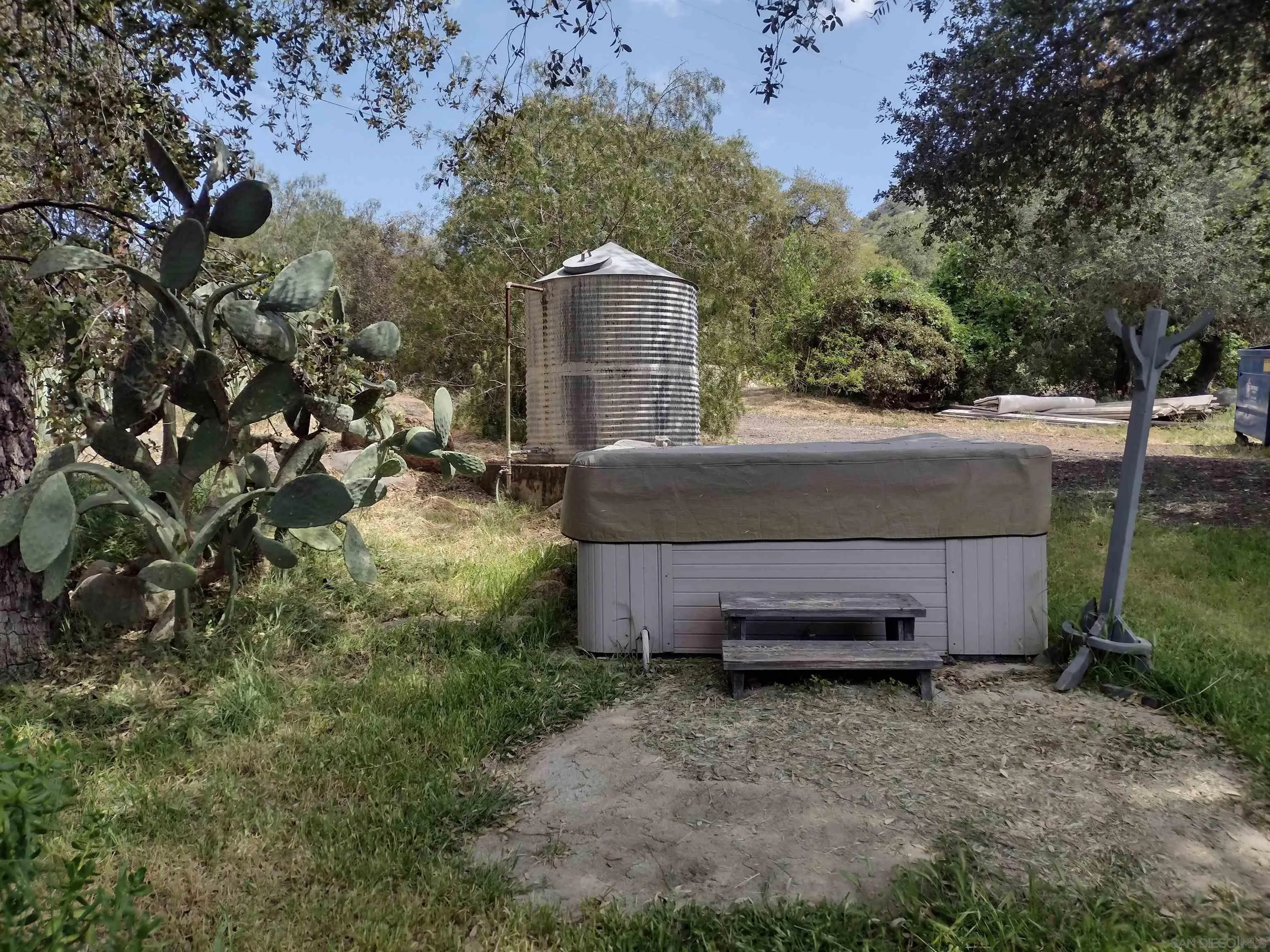 17661 Lyons Valley Road Jamul, CA 91935 - Photo 15 of 50 a backyard of a house with lots of green space