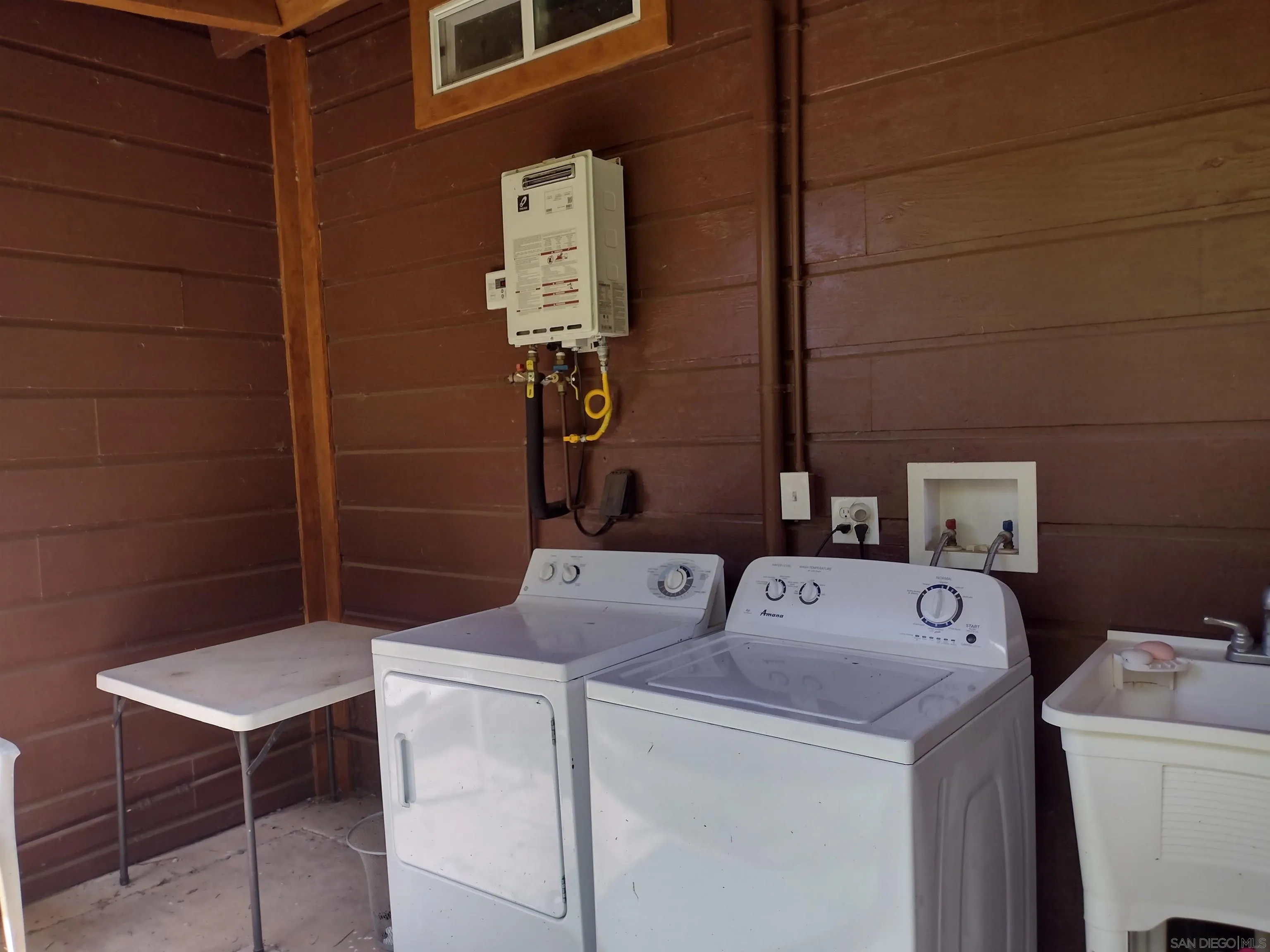 17661 Lyons Valley Road Jamul, CA 91935 - Photo 22 of 50 a utility room with dryer and washer