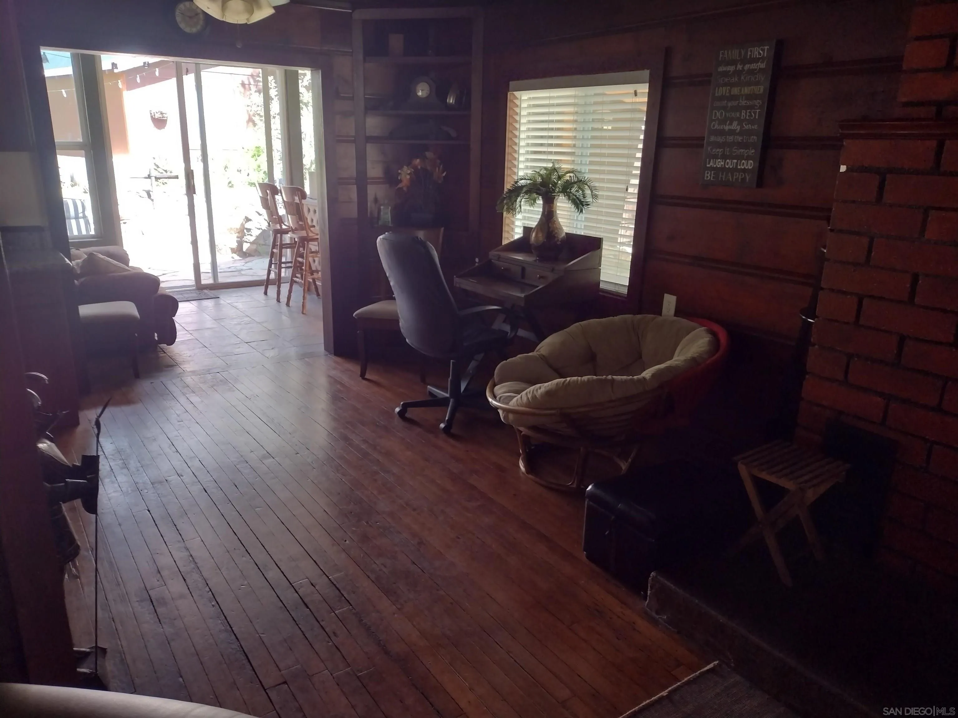 17661 Lyons Valley Road Jamul, CA 91935 - Photo 32 of 50 a living room with furniture and a wooden floor