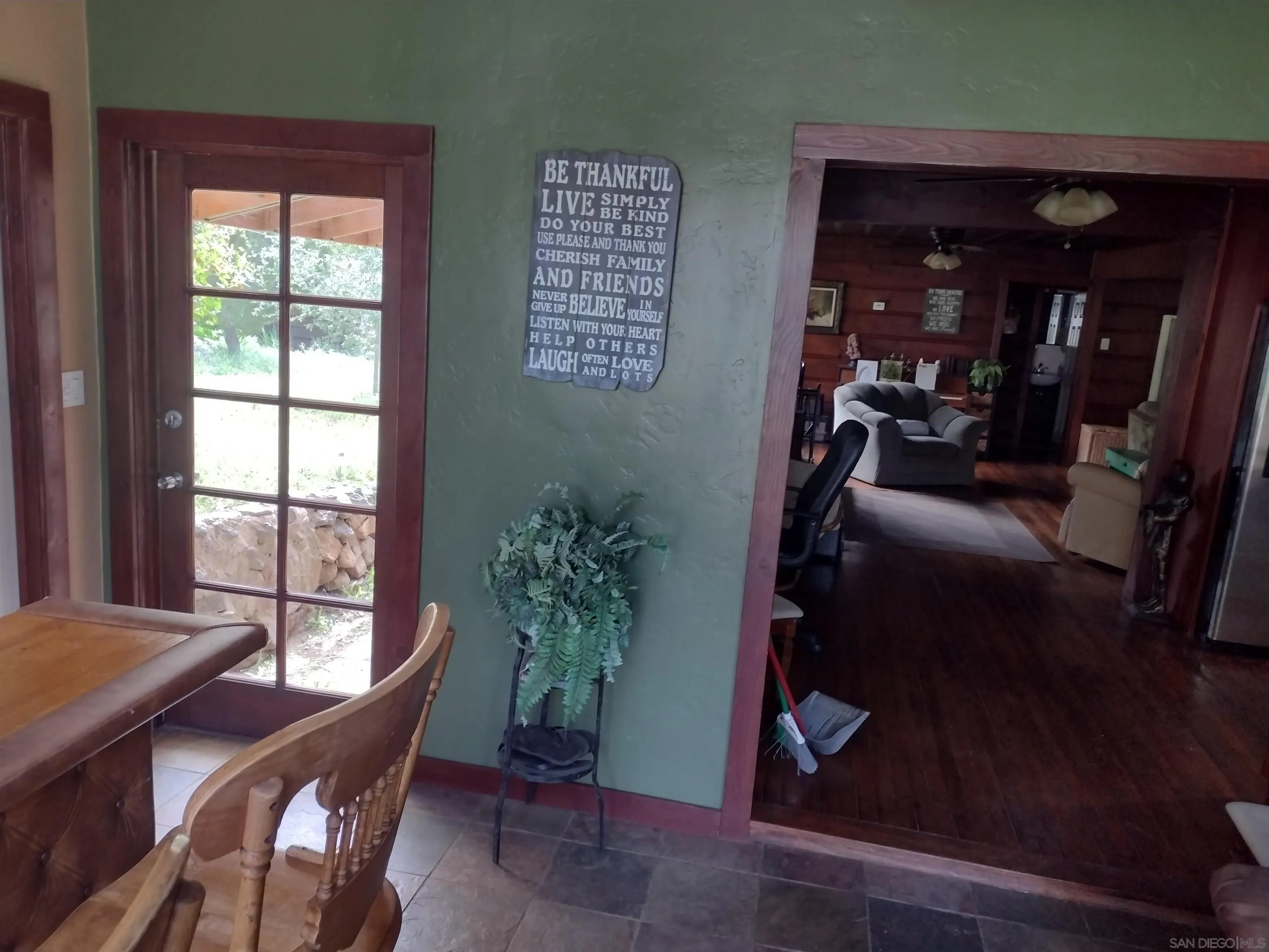 17661 Lyons Valley Road Jamul, CA 91935 - Photo 35 of 50 a view of a hallway with furniture and a potted plant