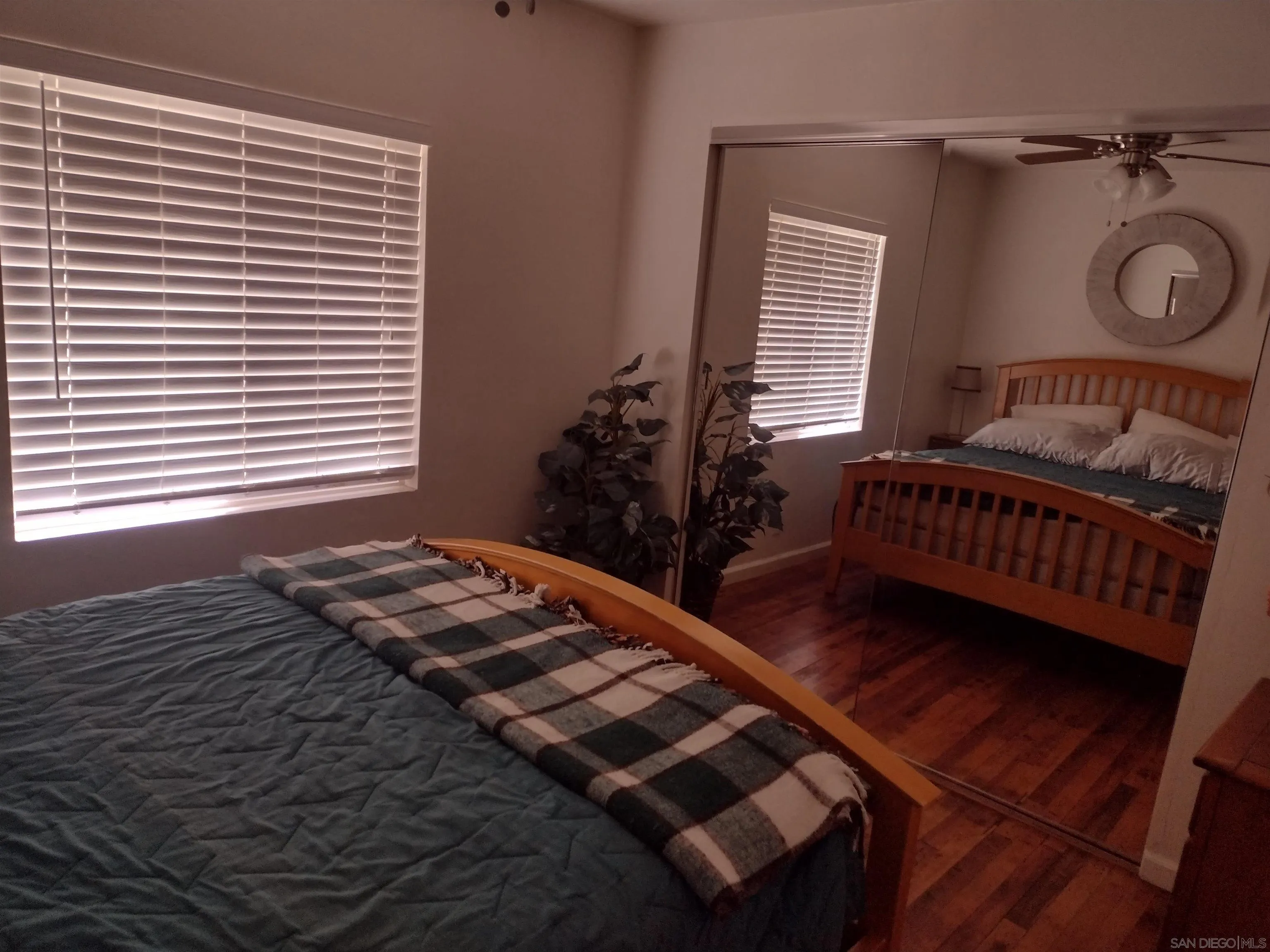 17661 Lyons Valley Road Jamul, CA 91935 - Photo 36 of 50 a bedroom with bed and a window