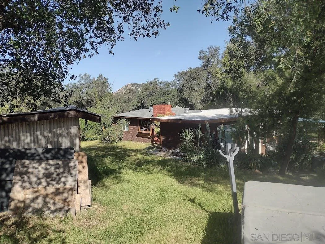 17661 Lyons Valley Road Jamul, CA 91935 - Photo 47 of 50 a backyard of a house with table and chairs