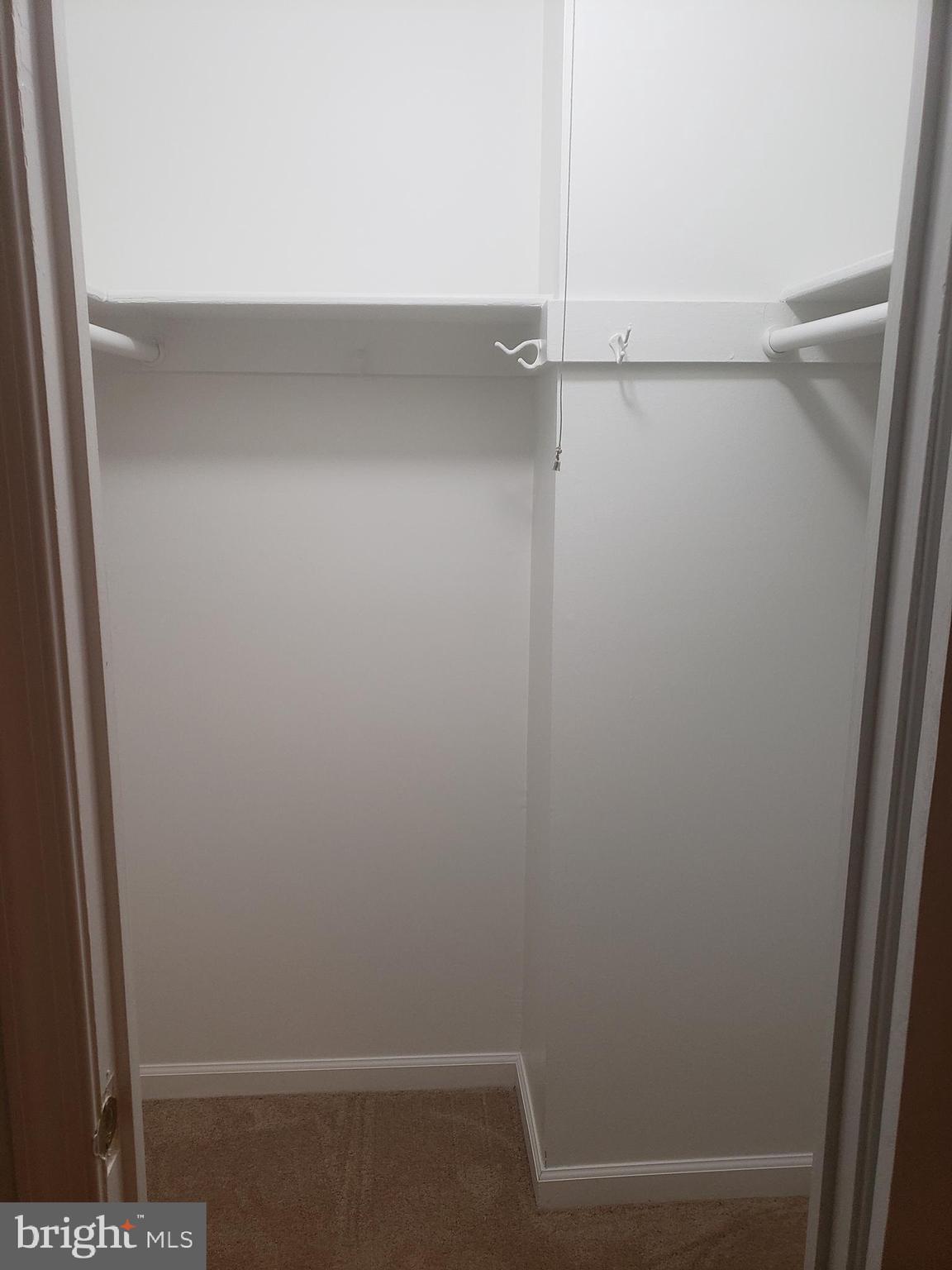 12658 Dara Drive, Unit 102 Woodbridge, VA 22192 - Photo 11 of 19 a view of small space with racks on the wall