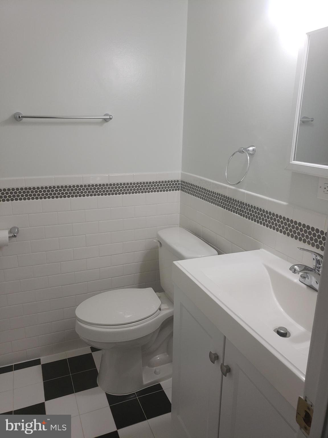 12658 Dara Drive, Unit 102 Woodbridge, VA 22192 - Photo 13 of 19 a bathroom with a sink and a toilet