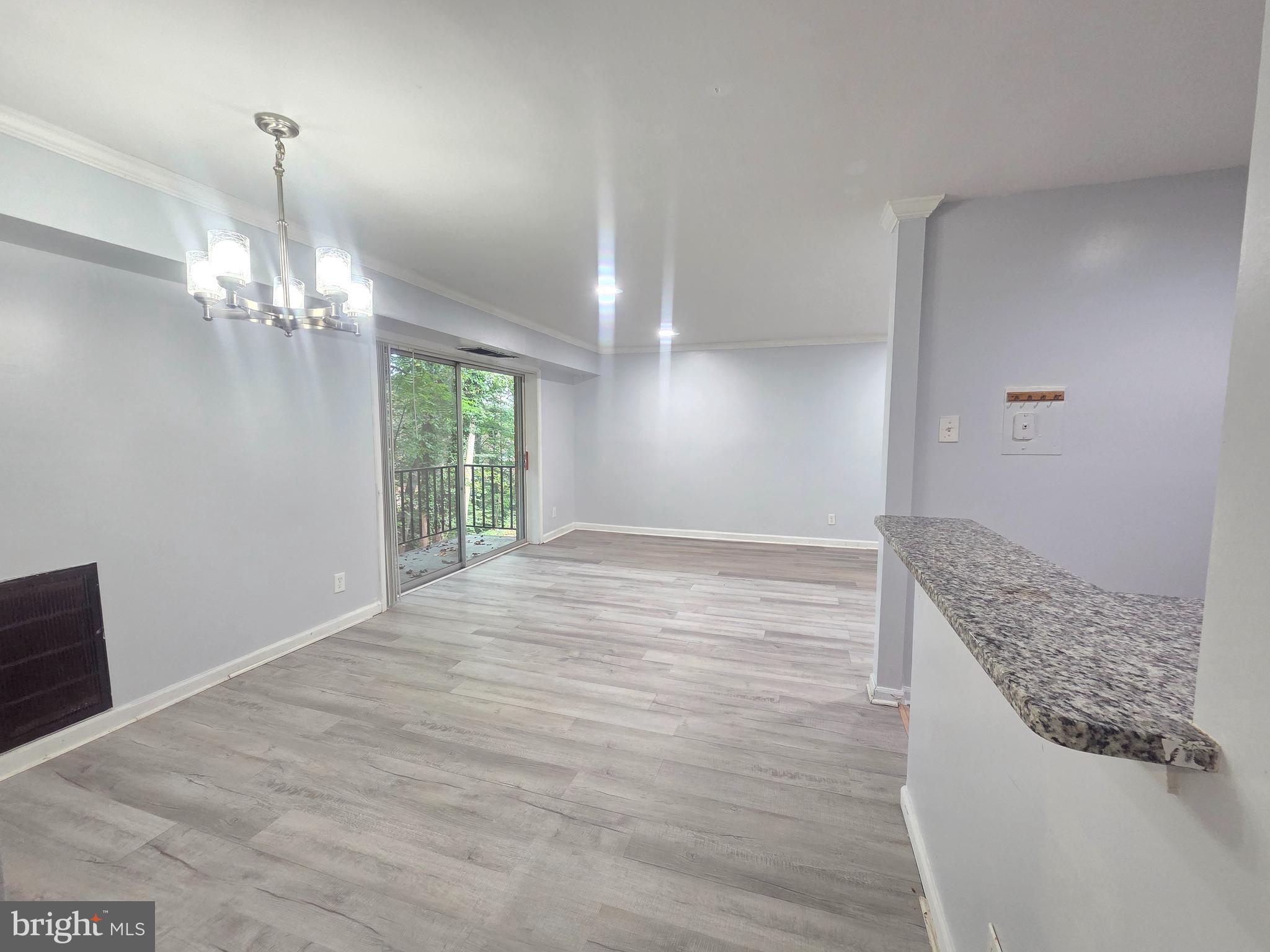 12658 Dara Drive, Unit 102 Woodbridge, VA 22192 - Photo 5 of 19 a view of kitchen and hallway