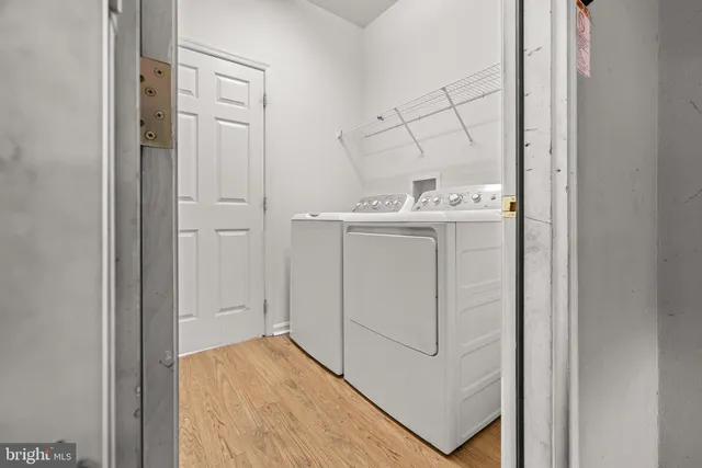 a view of a hallway with a window