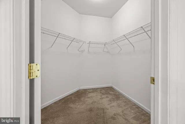 a bathroom with a sink a mirror and vanity