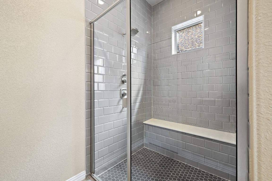 504 Leon Loop Liberty Hill, TX 78642 - Photo 20 of 40 a bathroom with a shower