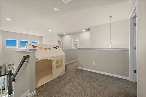 a view of a storage & utility room with two washing machine