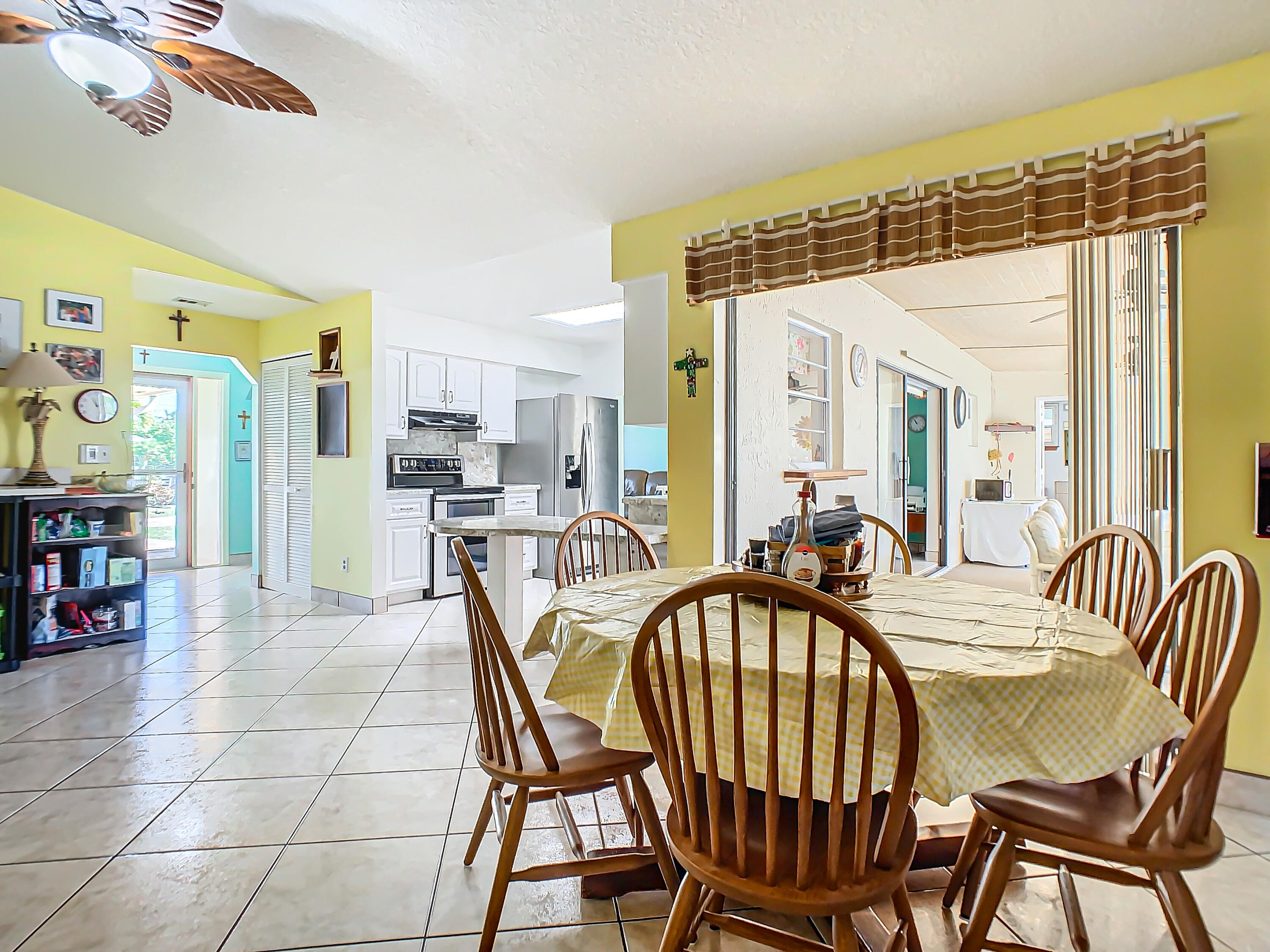 409 Surf Road Melbourne Beach, FL 32951 - Photo 12 of 34 a view of a dining room and livingroom view