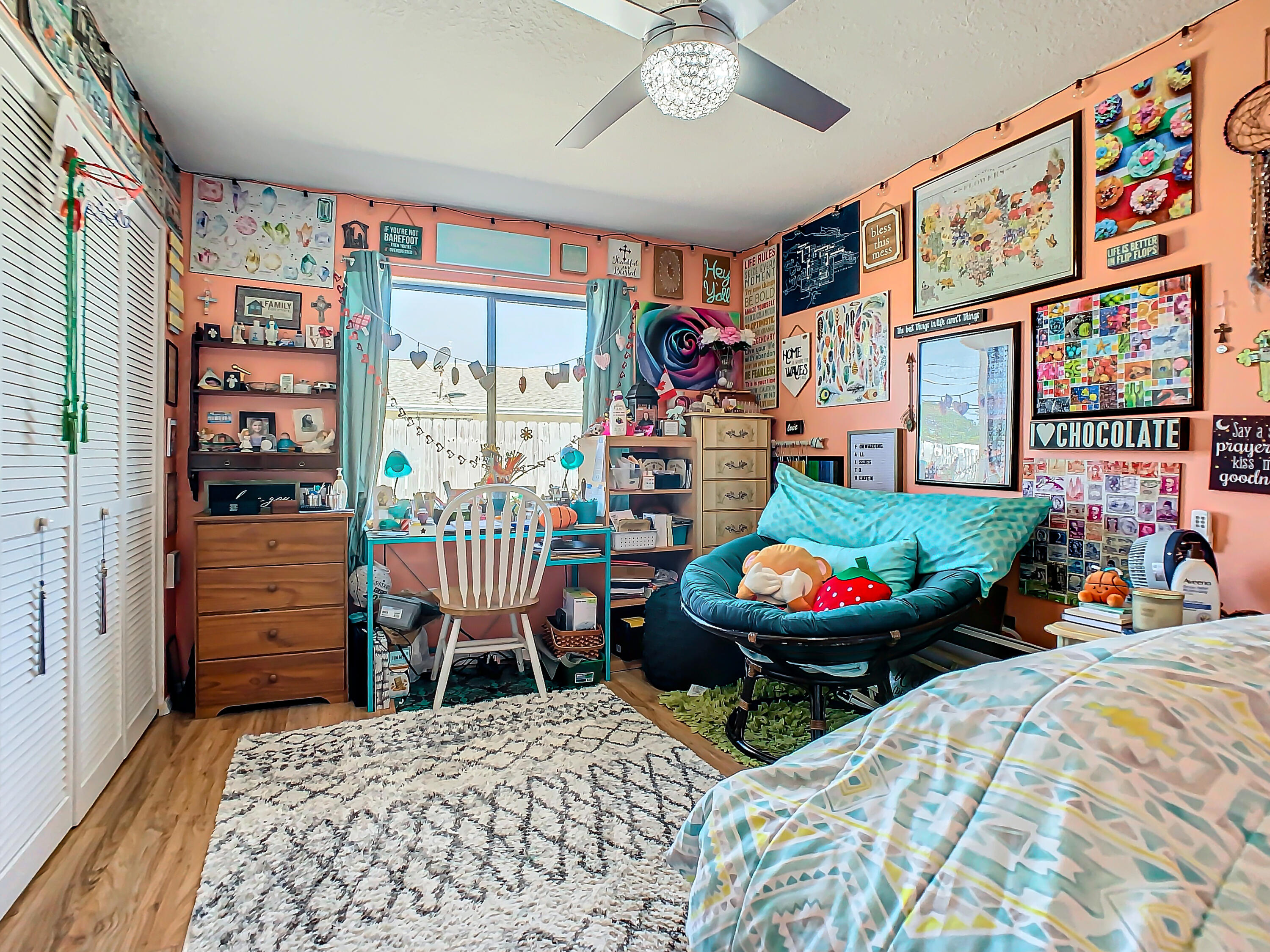 409 Surf Road Melbourne Beach, FL 32951 - Photo 17 of 34 a bed room with a bed and a chair