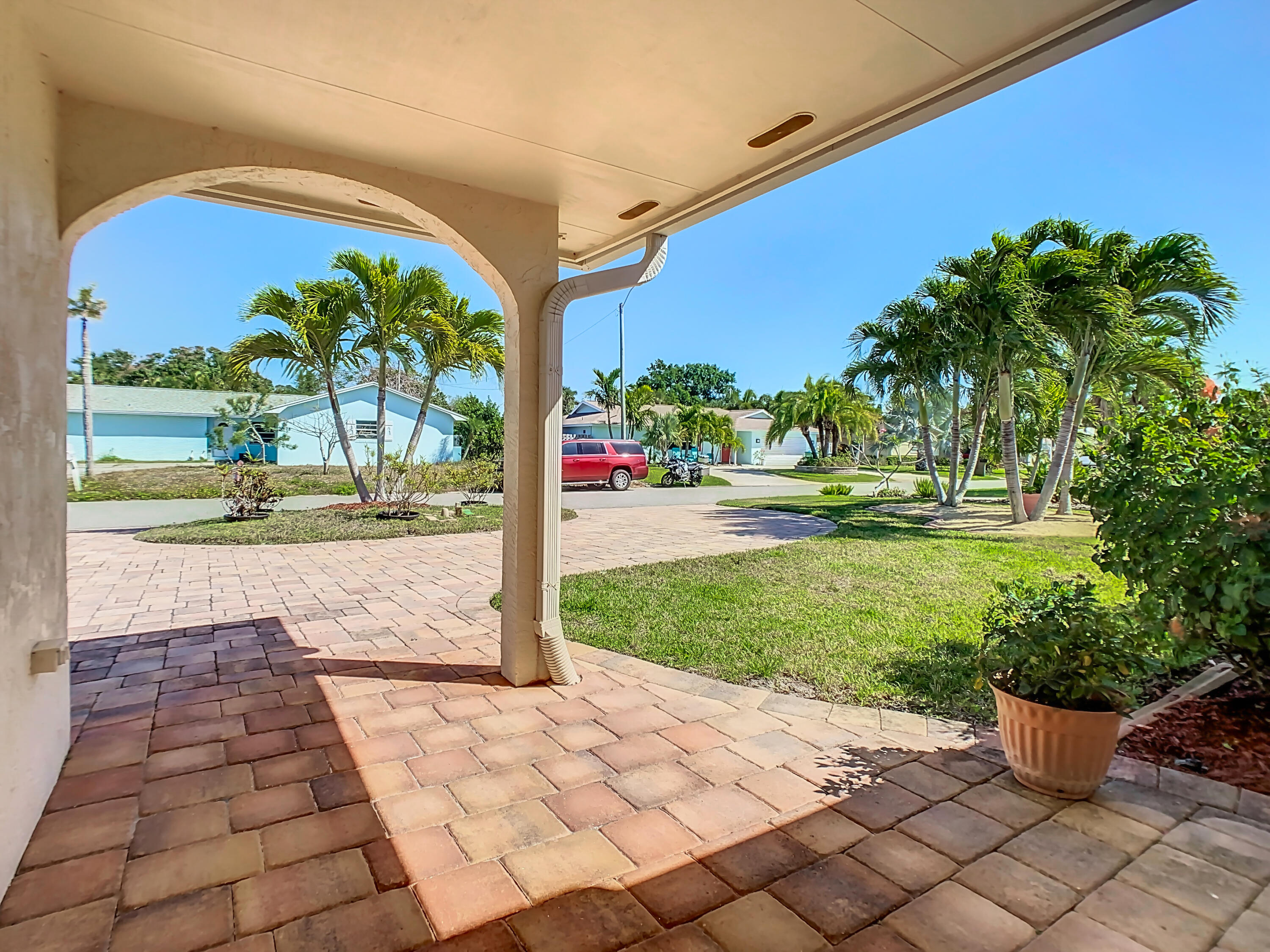 409 Surf Road Melbourne Beach, FL 32951 - Photo 3 of 34 a view of a garden