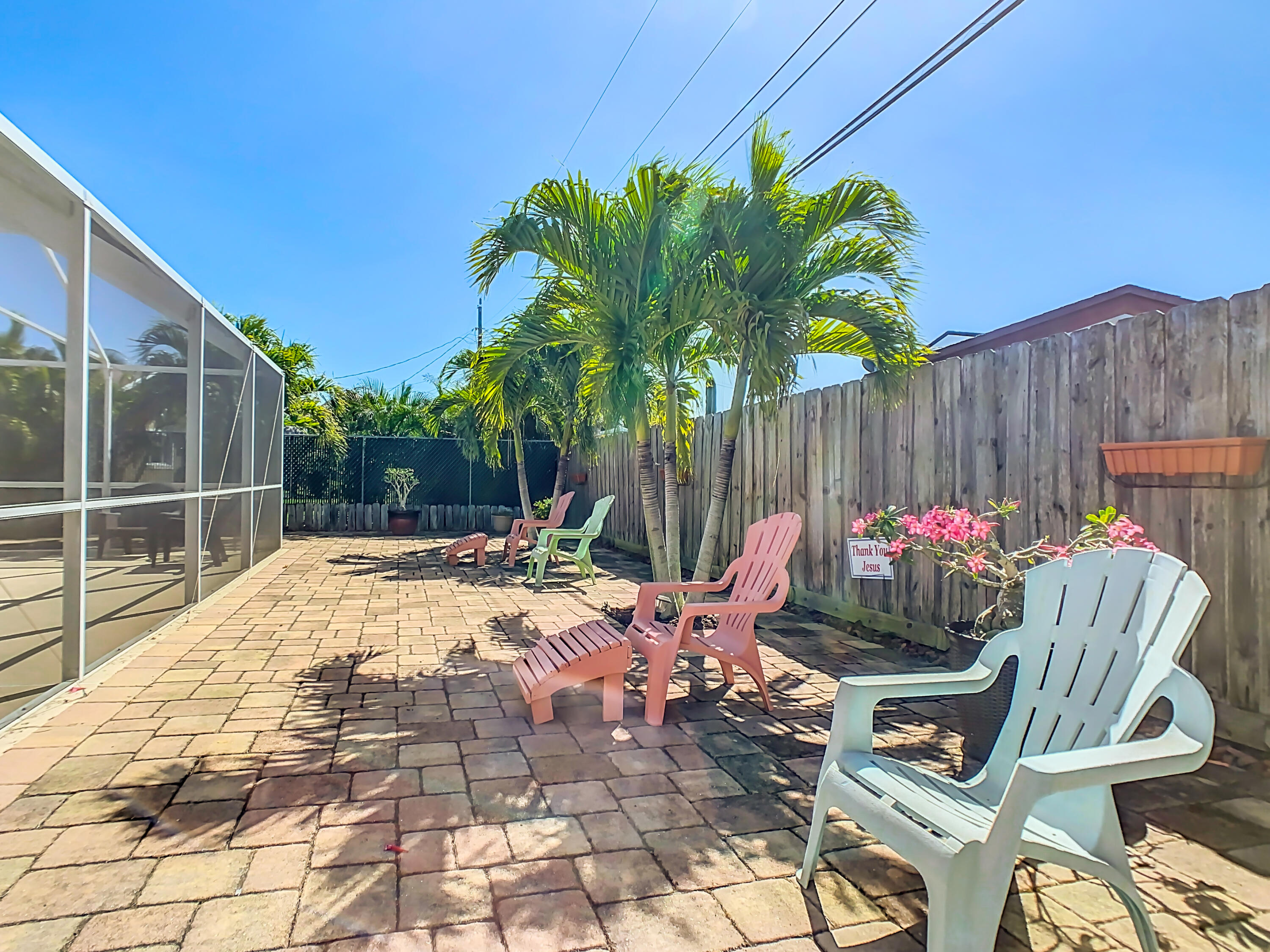 409 Surf Road Melbourne Beach, FL 32951 - Photo 32 of 34 a view of an chairs and tables in the patio