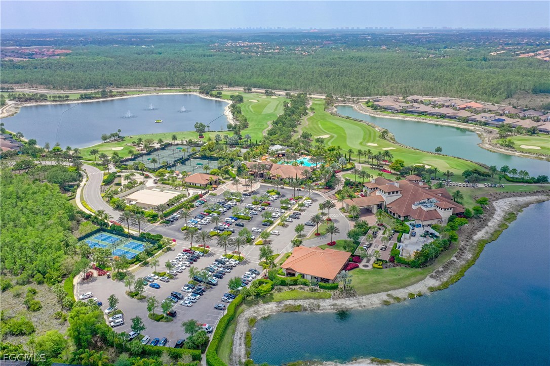 9345 Tulipano Terrace Naples, FL 34119 - Photo 47 of 50 an aerial view of ocean and residential houses with outdoor space