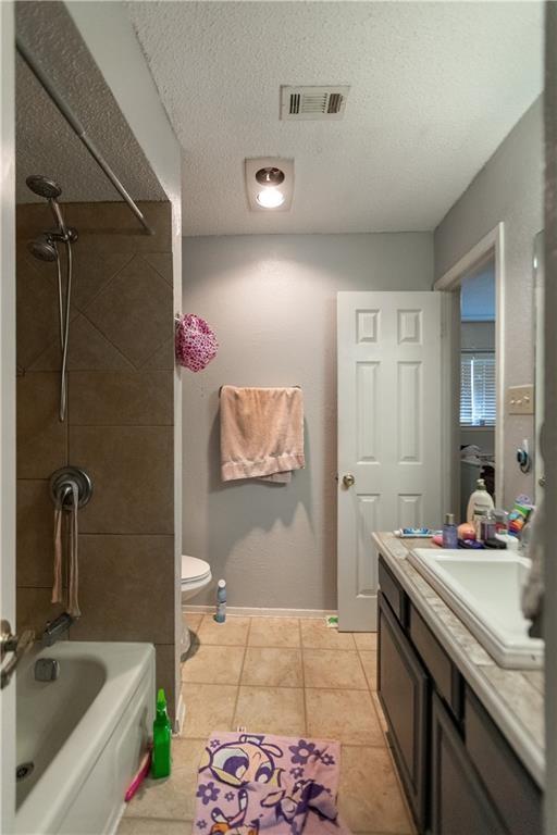 806 West 24th Street, Unit 314 Austin, TX 78705 - Photo 3 of 16 a bathroom with a sink mirror and a bathtub