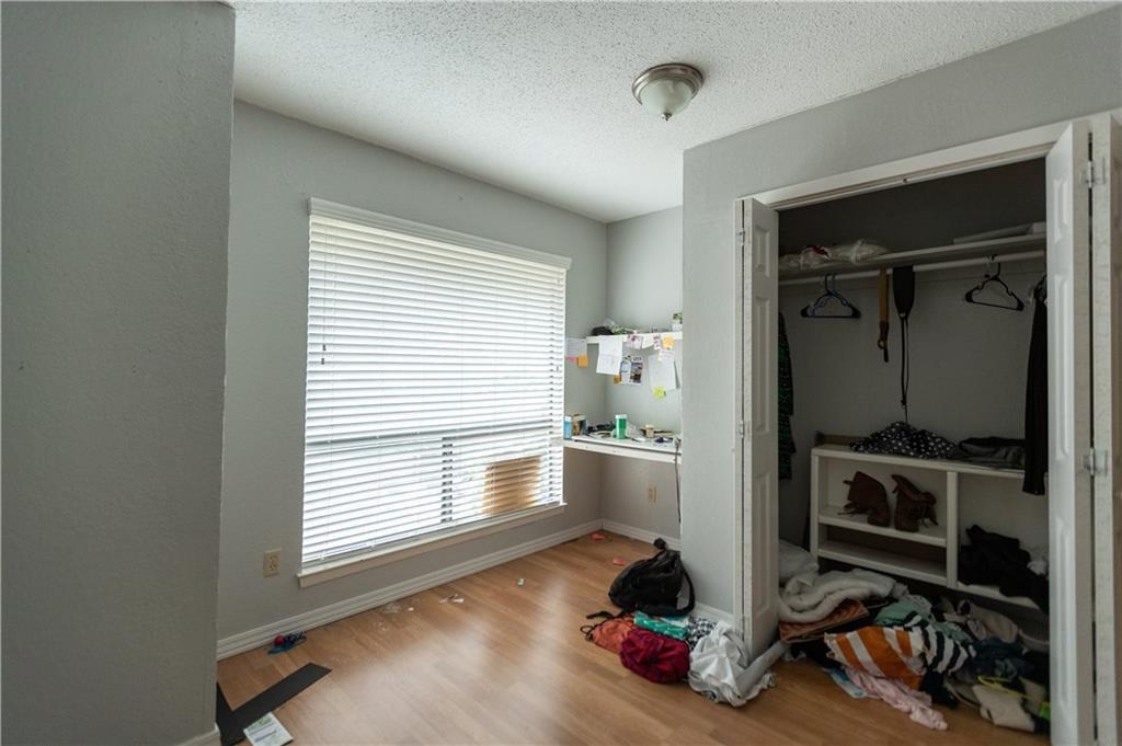 806 West 24th Street, Unit 314 Austin, TX 78705 - Photo 8 of 16 a room with furniture and a window