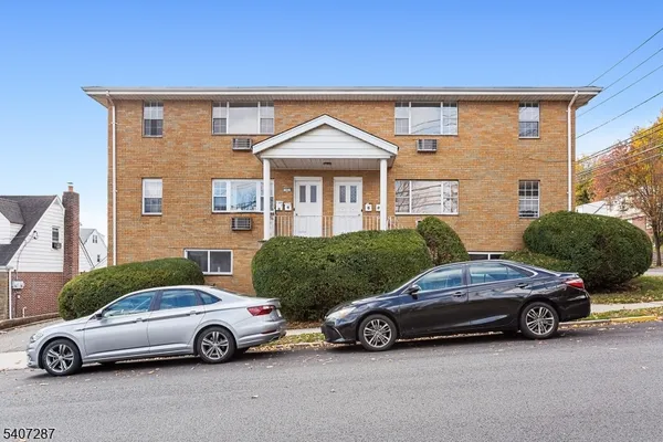 a car parked in front of a house