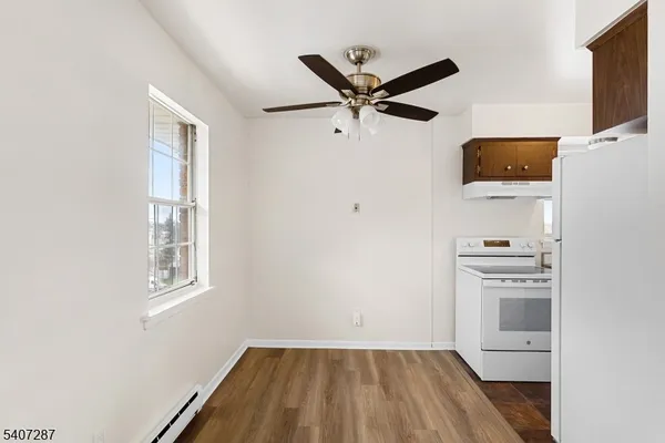 a view of a hallway with workspace