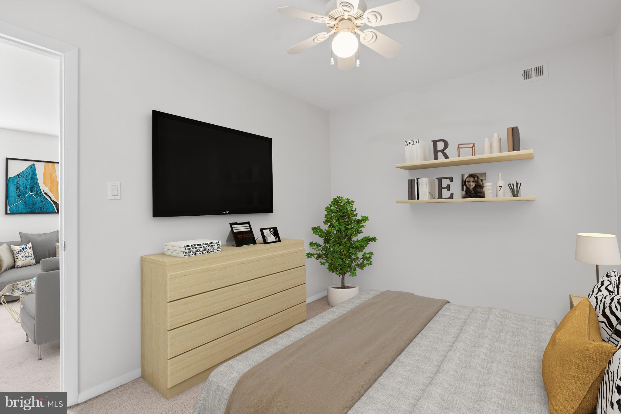 3245 Rio Drive, Unit 714 Falls Church, VA 22041 - Photo 25 of 30 a living room with furniture and a flat screen tv