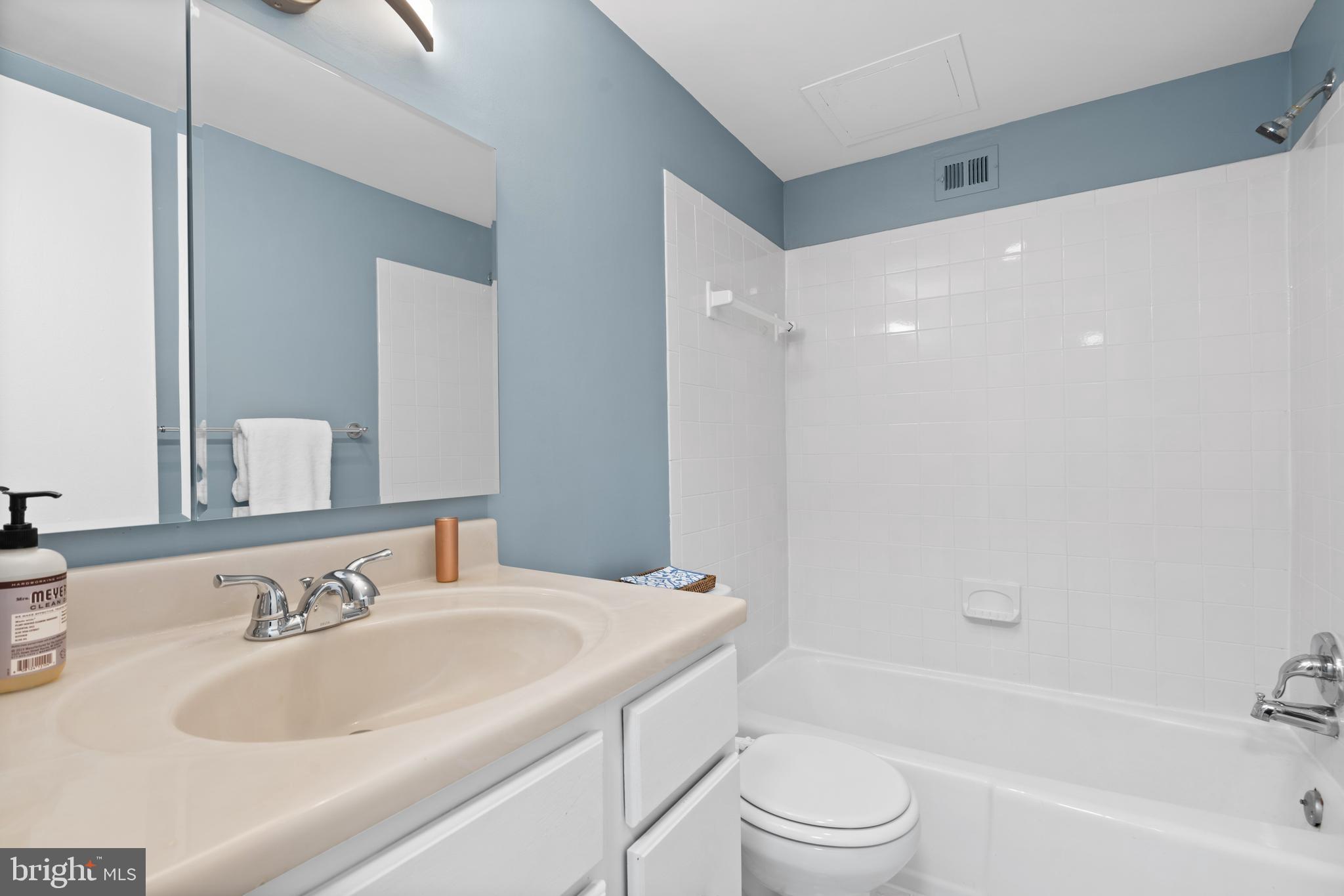 3245 Rio Drive, Unit 714 Falls Church, VA 22041 - Photo 28 of 30 a bathroom with a sink toilet and a bathtub