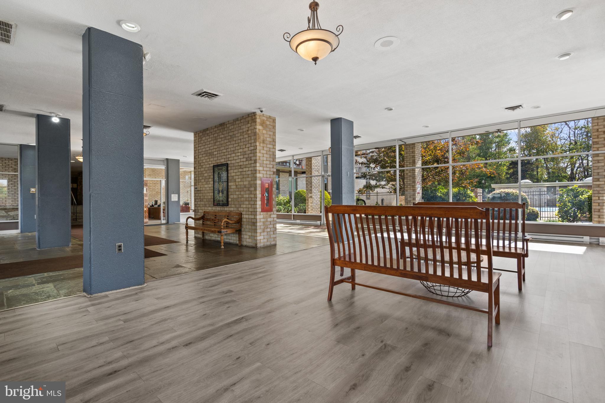 3245 Rio Drive, Unit 714 Falls Church, VA 22041 - Photo 5 of 30 an empty room with furniture and wooden floor