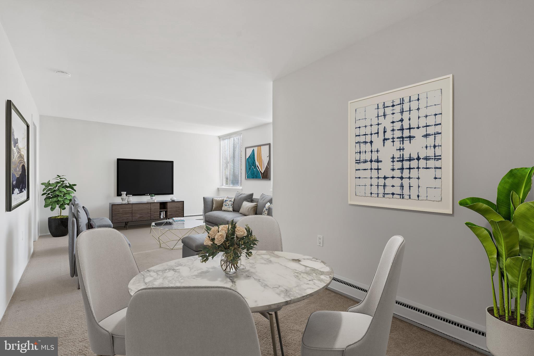 3245 Rio Drive, Unit 714 Falls Church, VA 22041 - Photo 10 of 30 a living room with furniture potted plant and windows