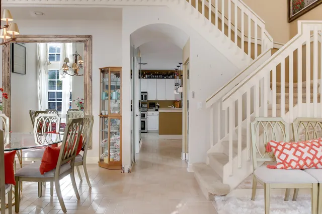 a view of an entryway with wooden floor