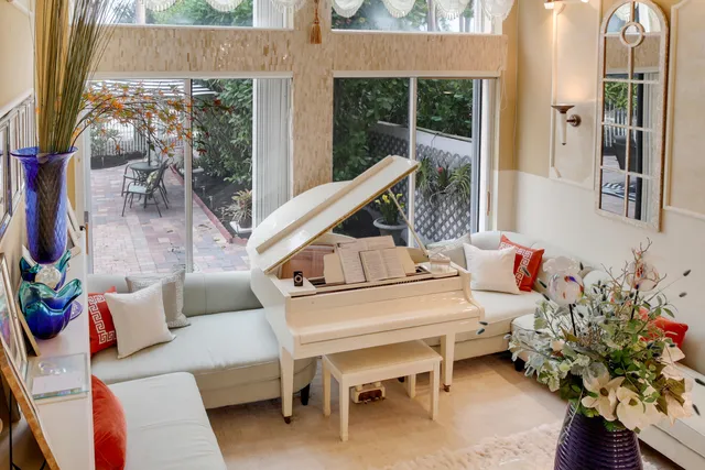 a view of an outdoor sitting area with furniture