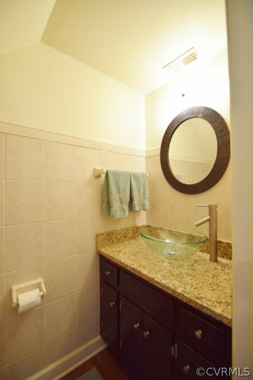 2301 Garrison Place Road Midlothian, VA 23112 - Photo 10 of 24 a bathroom with a granite countertop sink and a mirror